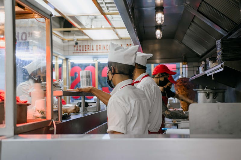 Starbird chicken kitchen team preparing fresh orders